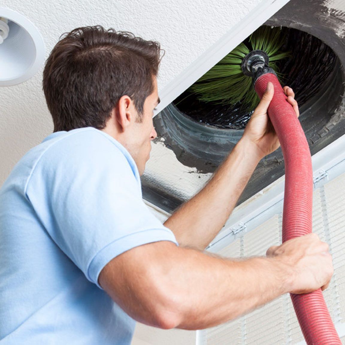 residential and commercial duct cleaning performed by DiMarco & Associates technician.
