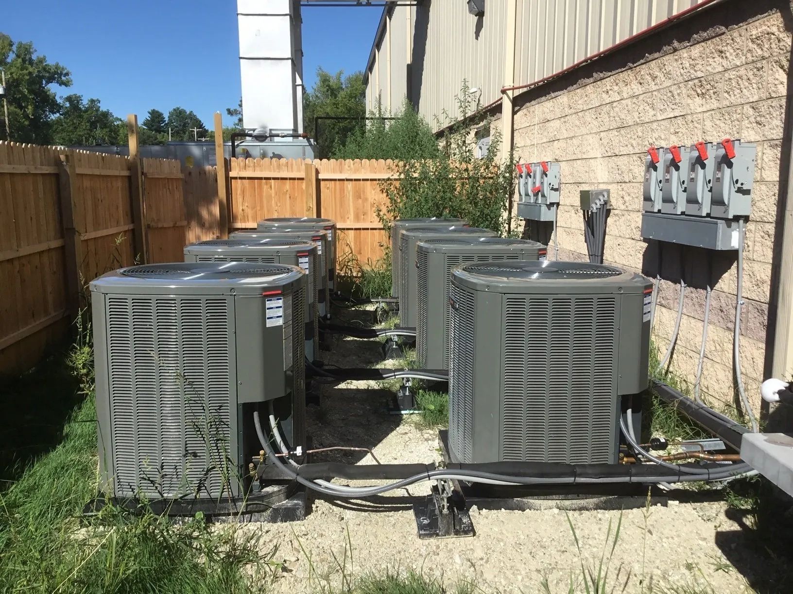 outdoor commercial Inverter Placement Behind Building