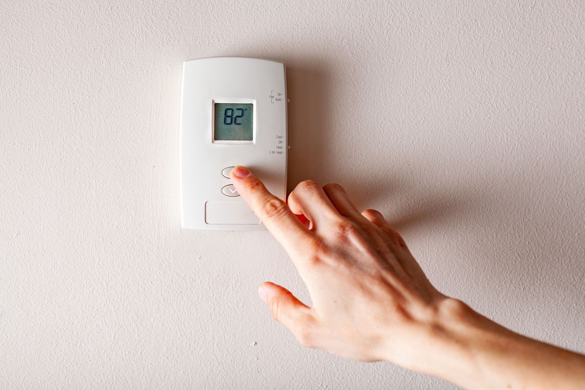 Residential thermostat controls.