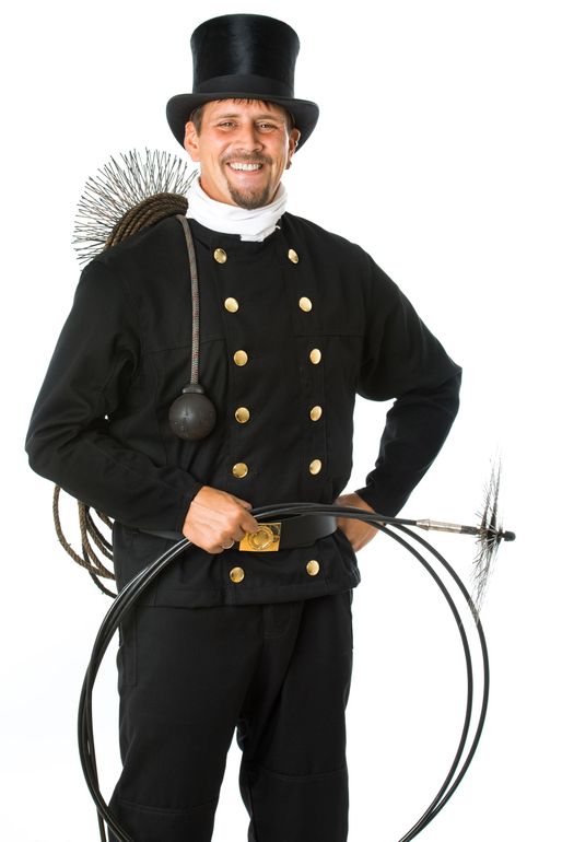 man holding a chimney sweep brush