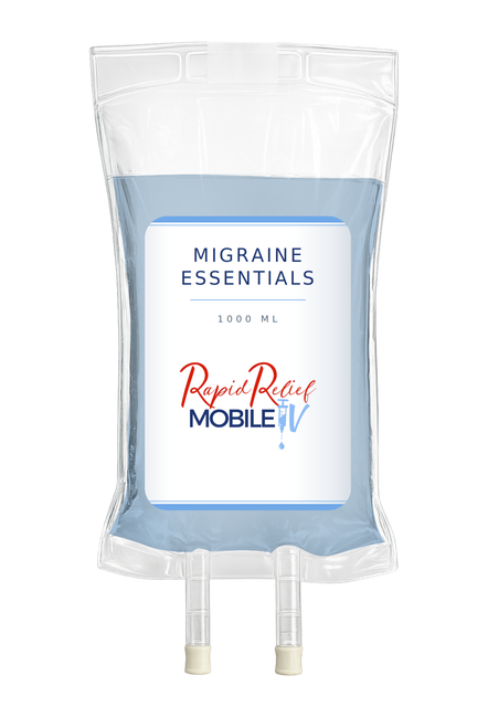 Clear IV bag labeled “Migraine Essentials” with blue fluid and tubes