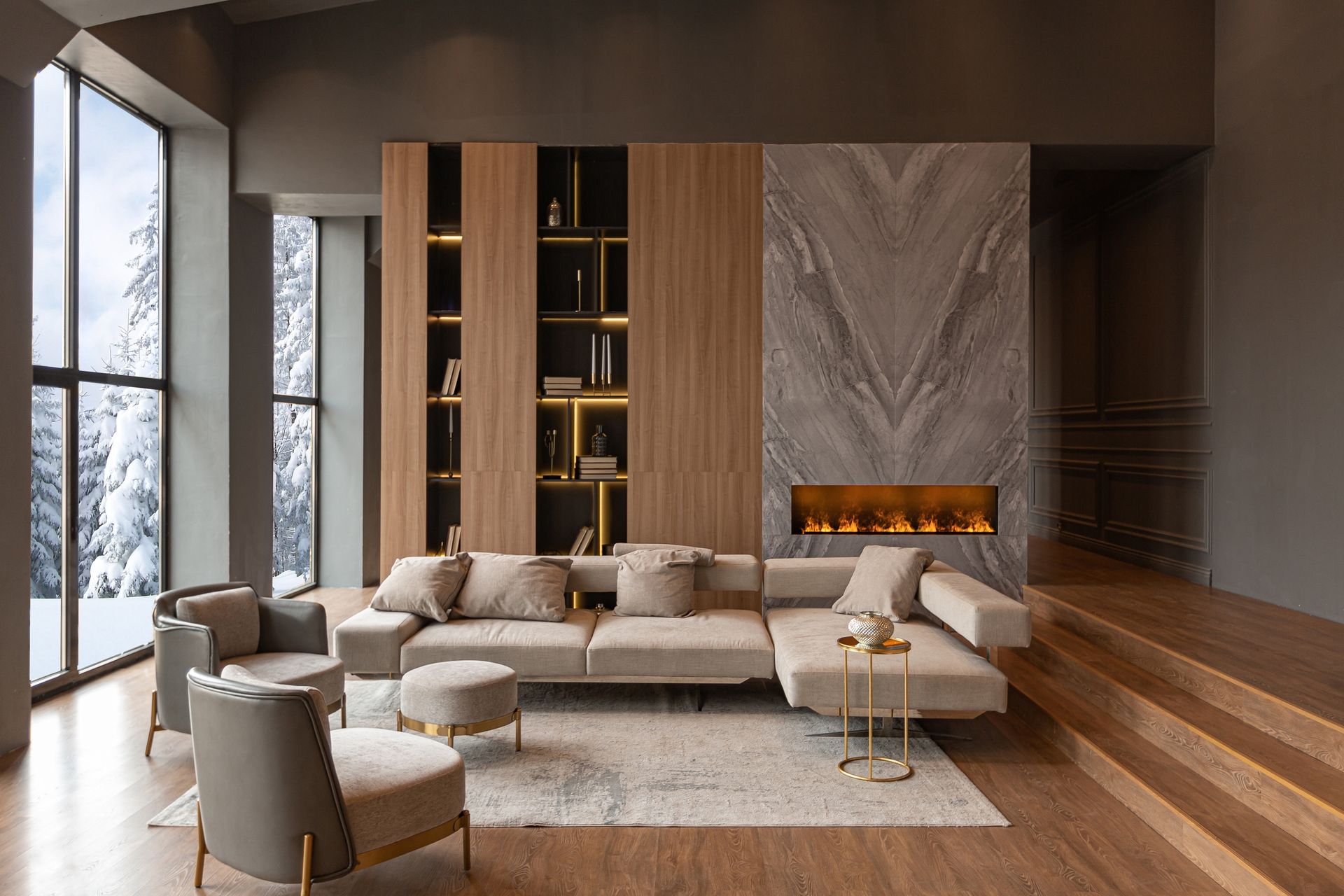 A living room with a couch , chairs , and a fireplace.