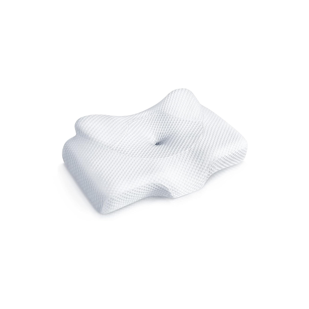A white pillow with a hole in the middle on a white background.