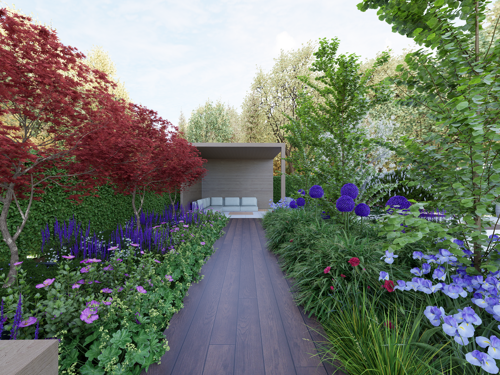 Wooden walkway through a colorful garden leading to a shaded seating area with light blue cushions.