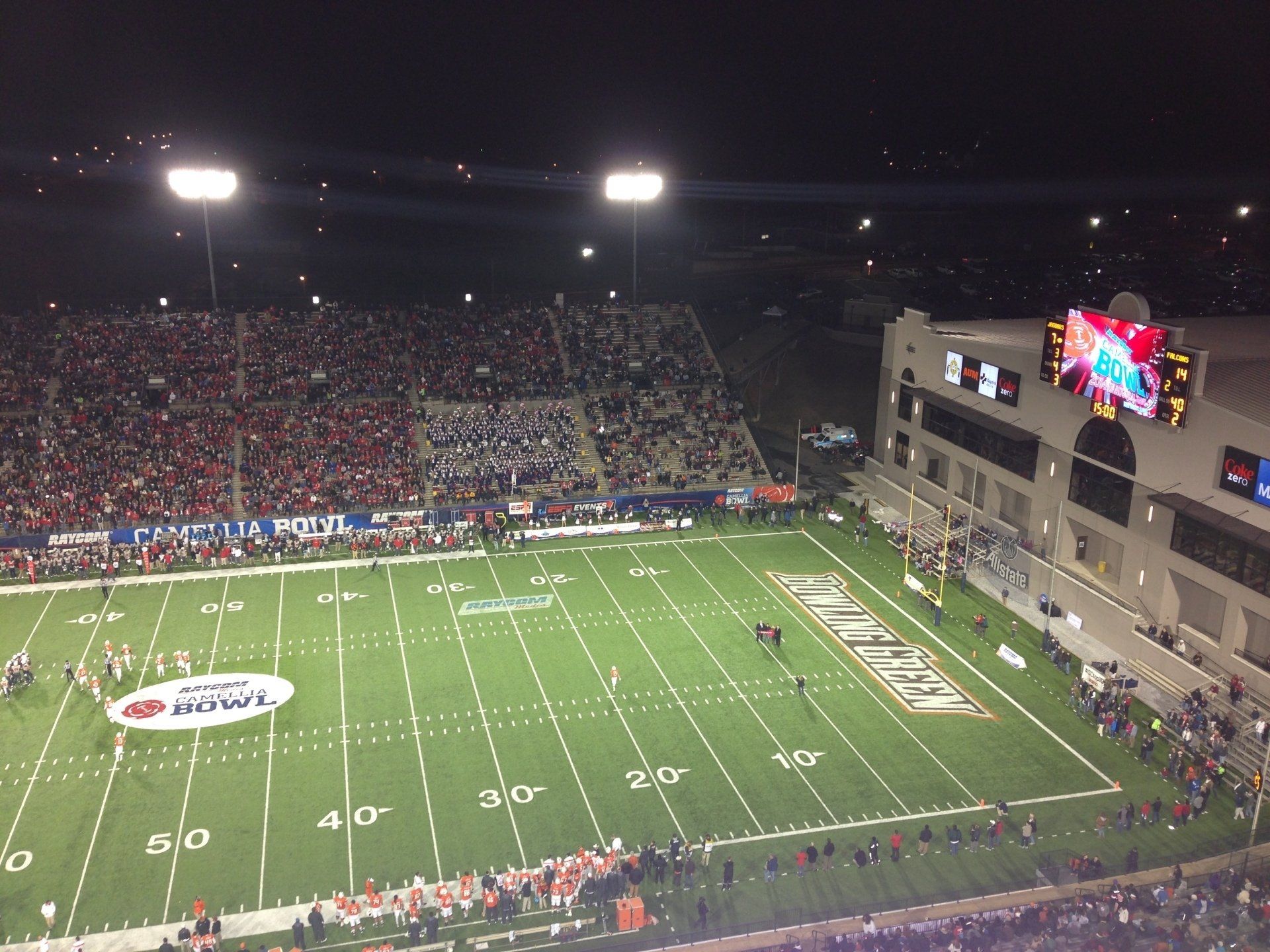 An aerial view of a football field at night