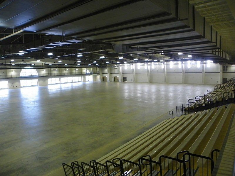 A large empty building with stairs leading up to it
