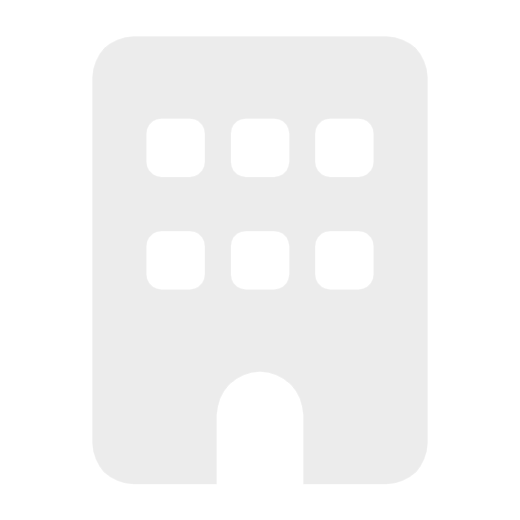 Light gray building icon with six windows and an arched doorway.