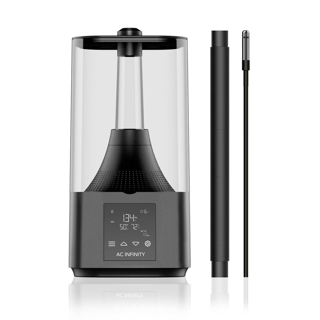 Black and transparent electric humidifier with digital display, side filter, and brush on white background