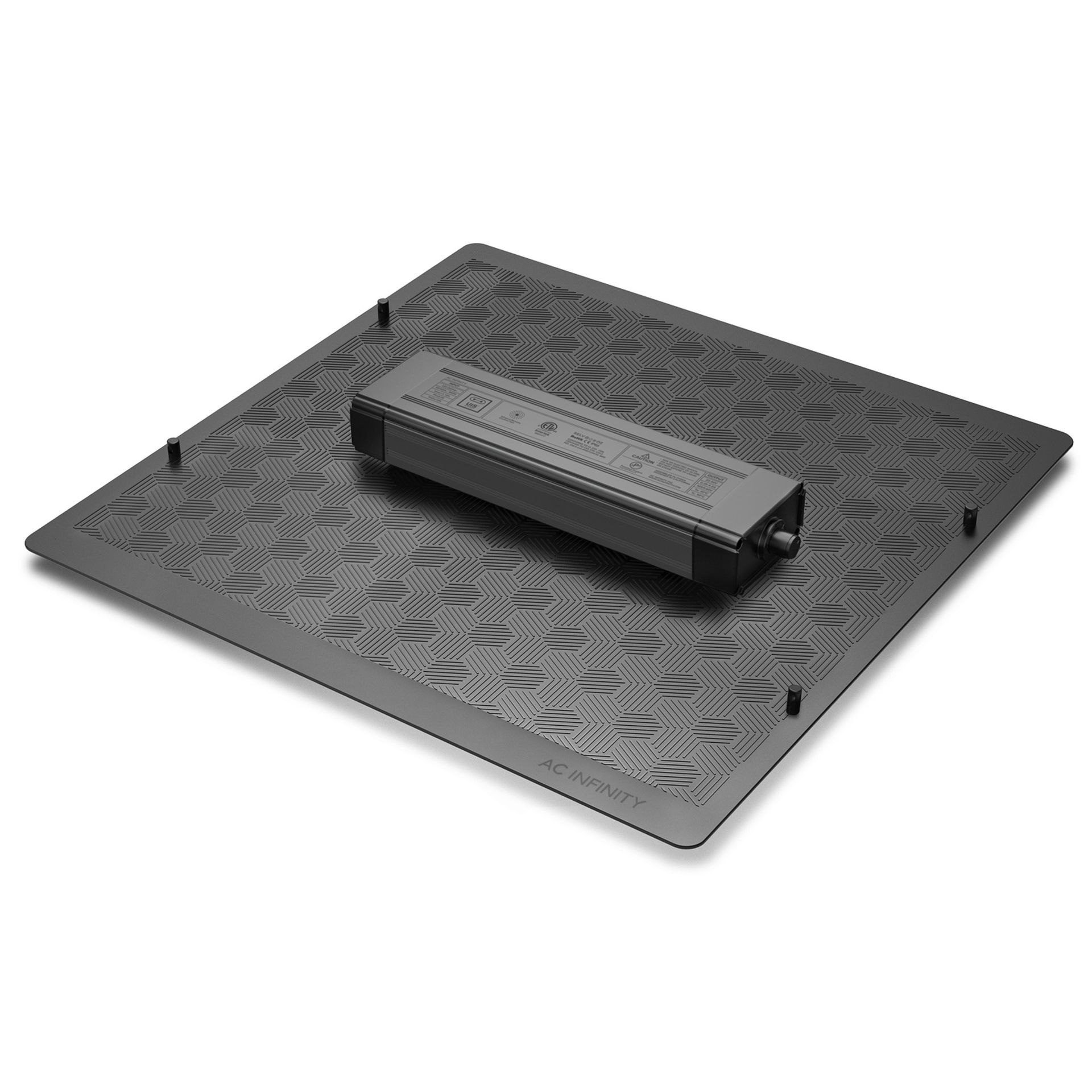 Black rectangular foot pedal on a textured black platform