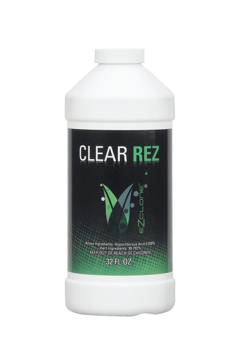 White plastic bottle labeled “CLEAR REZ” with a black and green design
