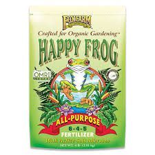 Happy Frog all-purpose fertilizer bag with green frog logo and colorful plants on a yellow-green package