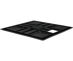 Black rectangular plastic panel with molded compartments and a small white cutout on a white background