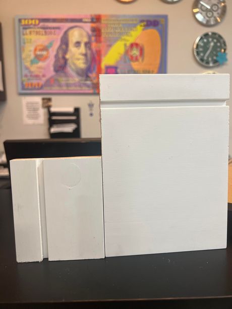 A picture of franklin d. roosevelt is behind some white blocks