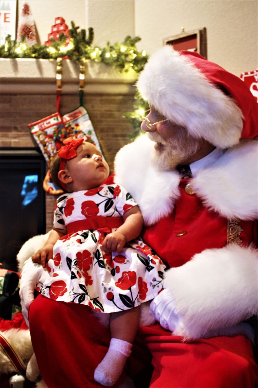 Merry Makers Santa and baby Beck.
Hire Santa today for your holiday party.