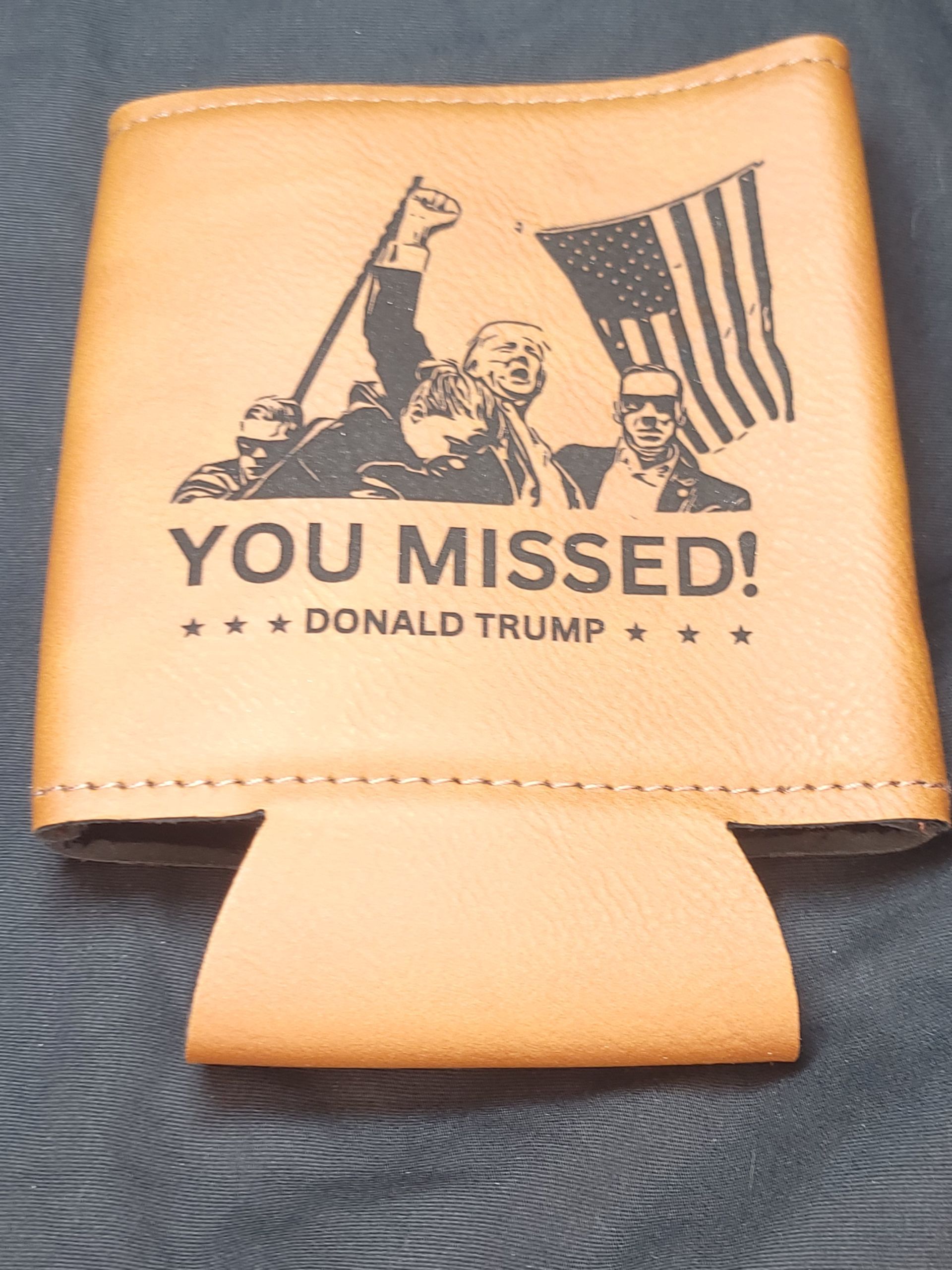A can holder that says you missed on it