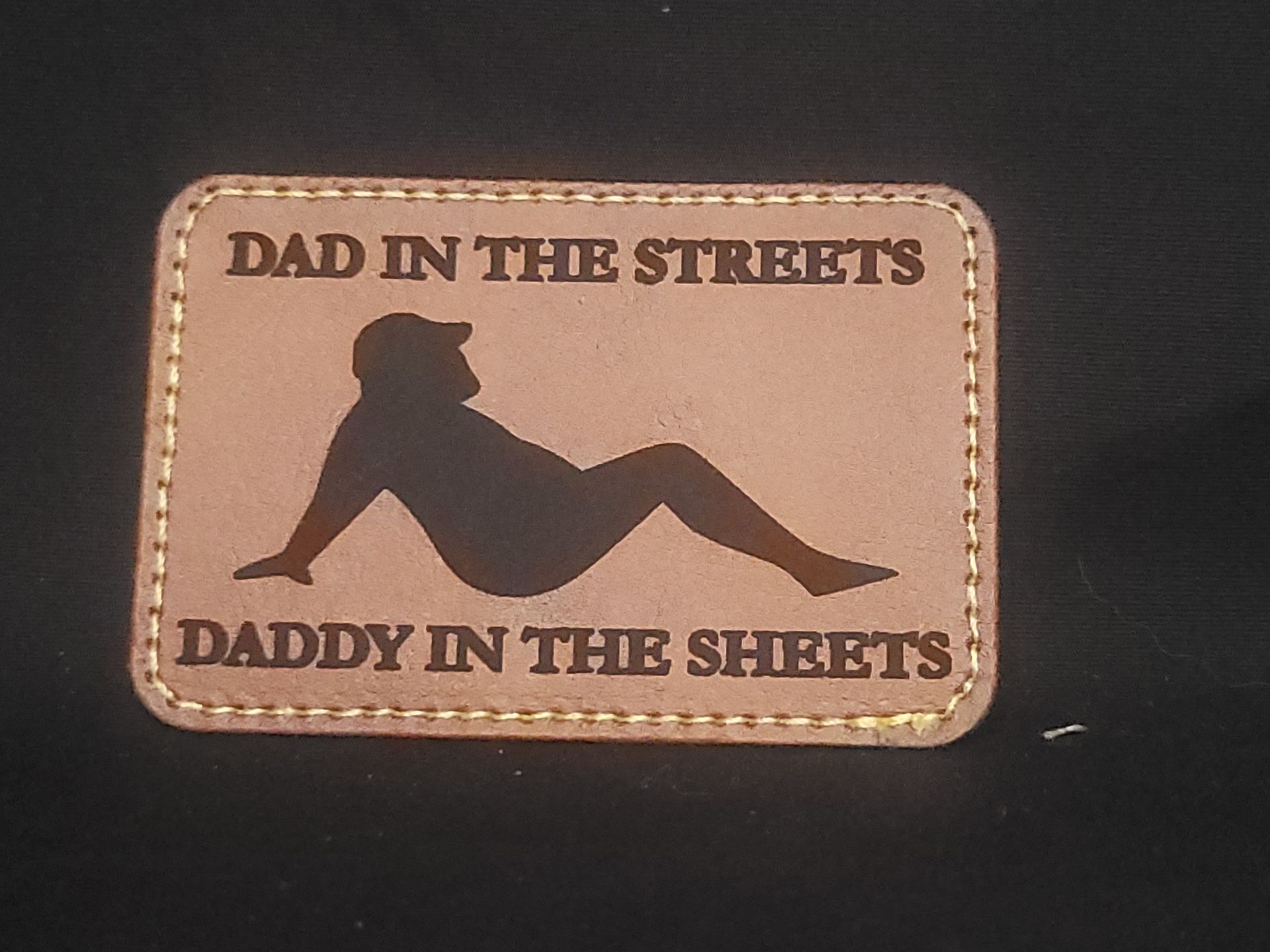 A patch that says dad in the streets daddy in the sheets