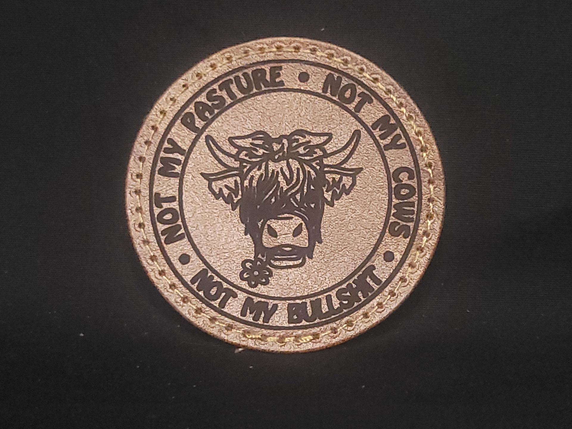 A coaster that says