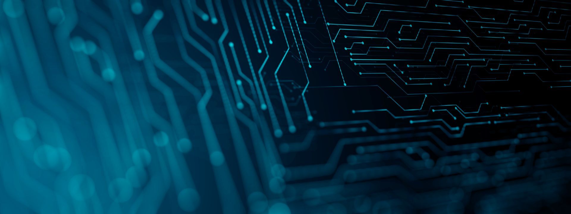 A close up of a circuit board on a blue background.