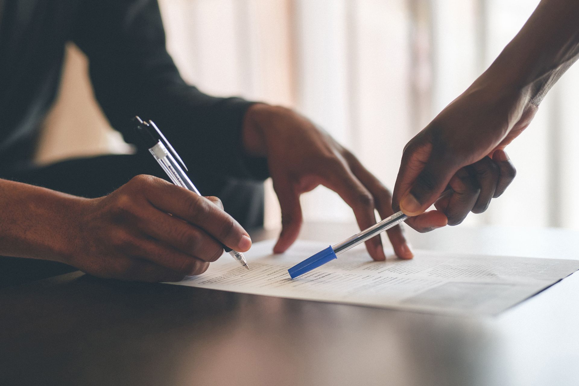 Attorney Discussing a Contract — Durham, NC — Perry, Perry & Perry, P.A.