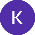 Purple circle with a white letter “K” in the center.