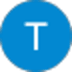 Blue circular icon with a white capital T in the center