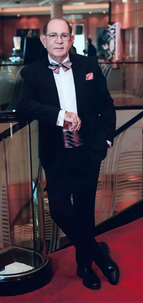 Photo of our Artistic Director Dean McDowell in a tuxedo.