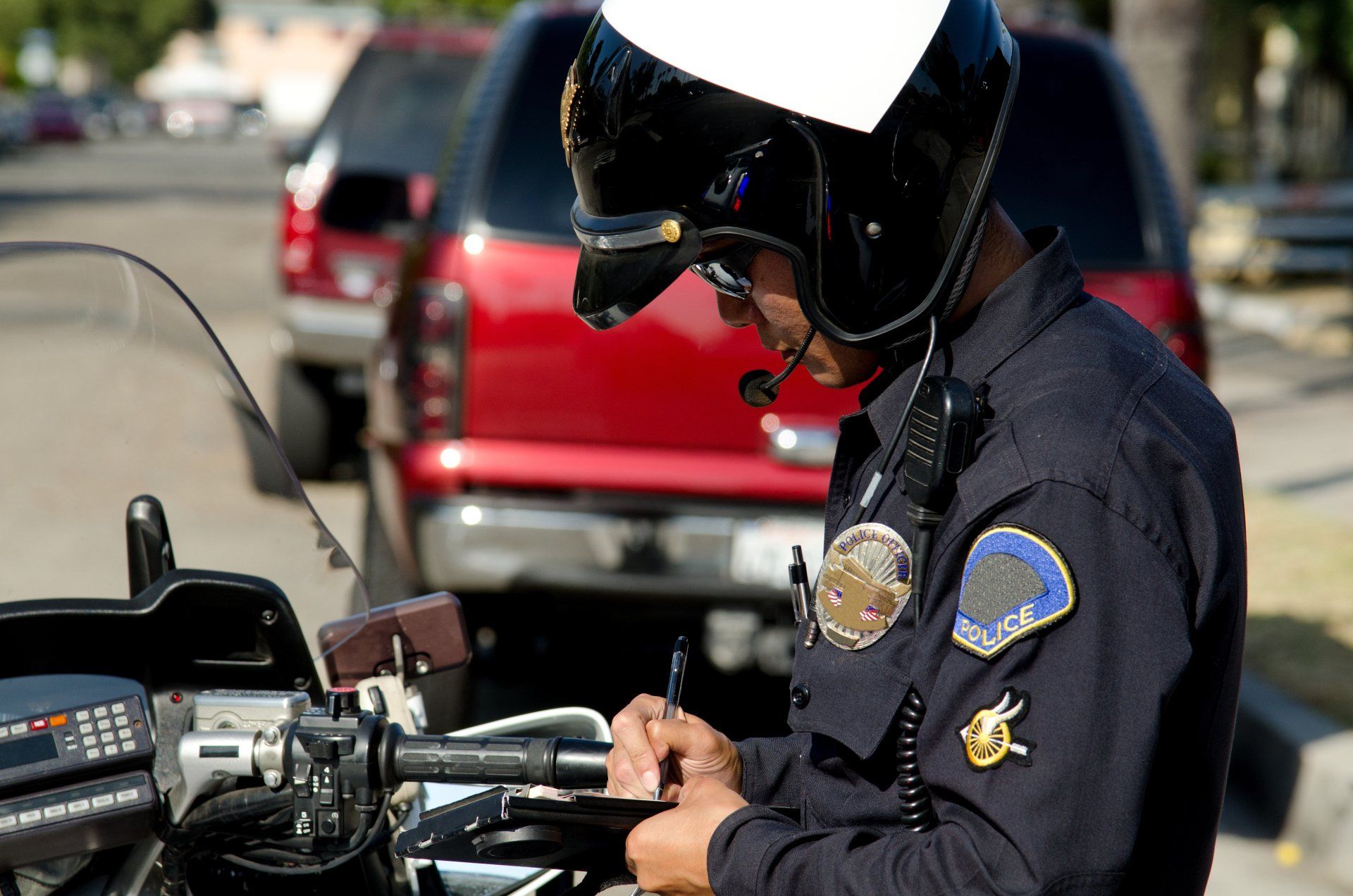A Motorcycle Police Officer On A Car Stop — Chicago, IL — Clover Insurance Agency A Motorcycle Police Officer On A Car Stop — Chicago, IL — Clover Insurance Agency
