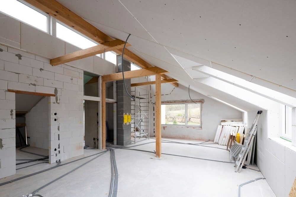 An Empty Room With a Ceiling That is Being Remodeled — Mark's Flooring & Handyman Services in The Entrance, NSW
