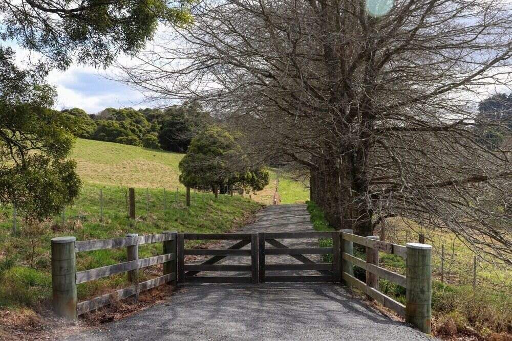 There Is A Wooden Gate On The Side Of The Road — Mark's Flooring & Handyman Services In The Entrance, NSW