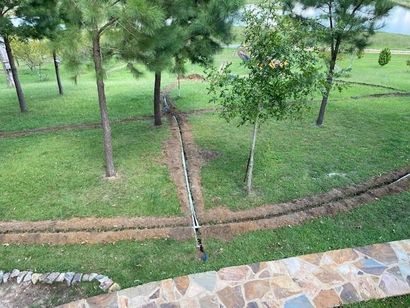 Man Spinning His Daughter Around in Their Backyard — Montgomery, AL — Lawns by Scott