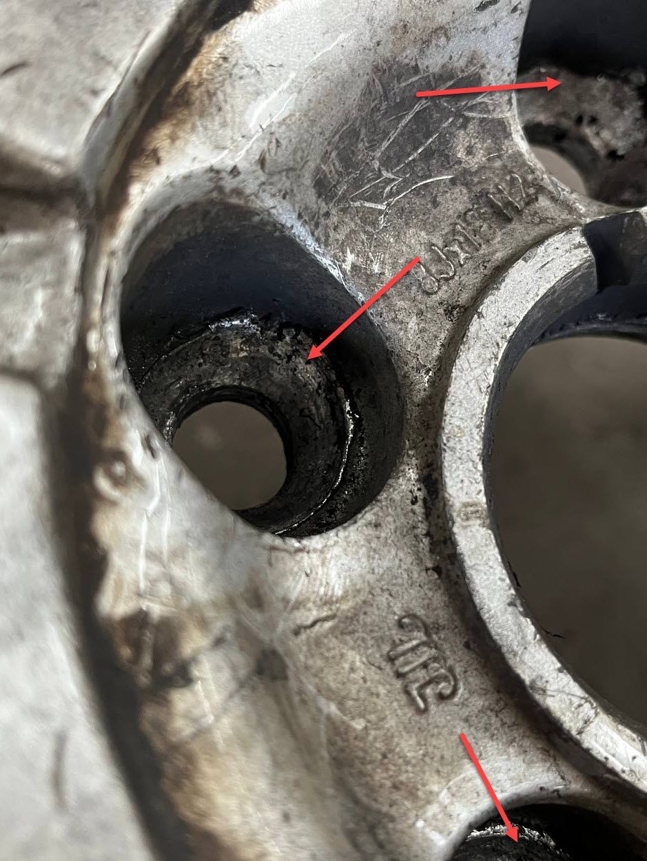 Damaged wheel bolt seats on Audi S4 wheel