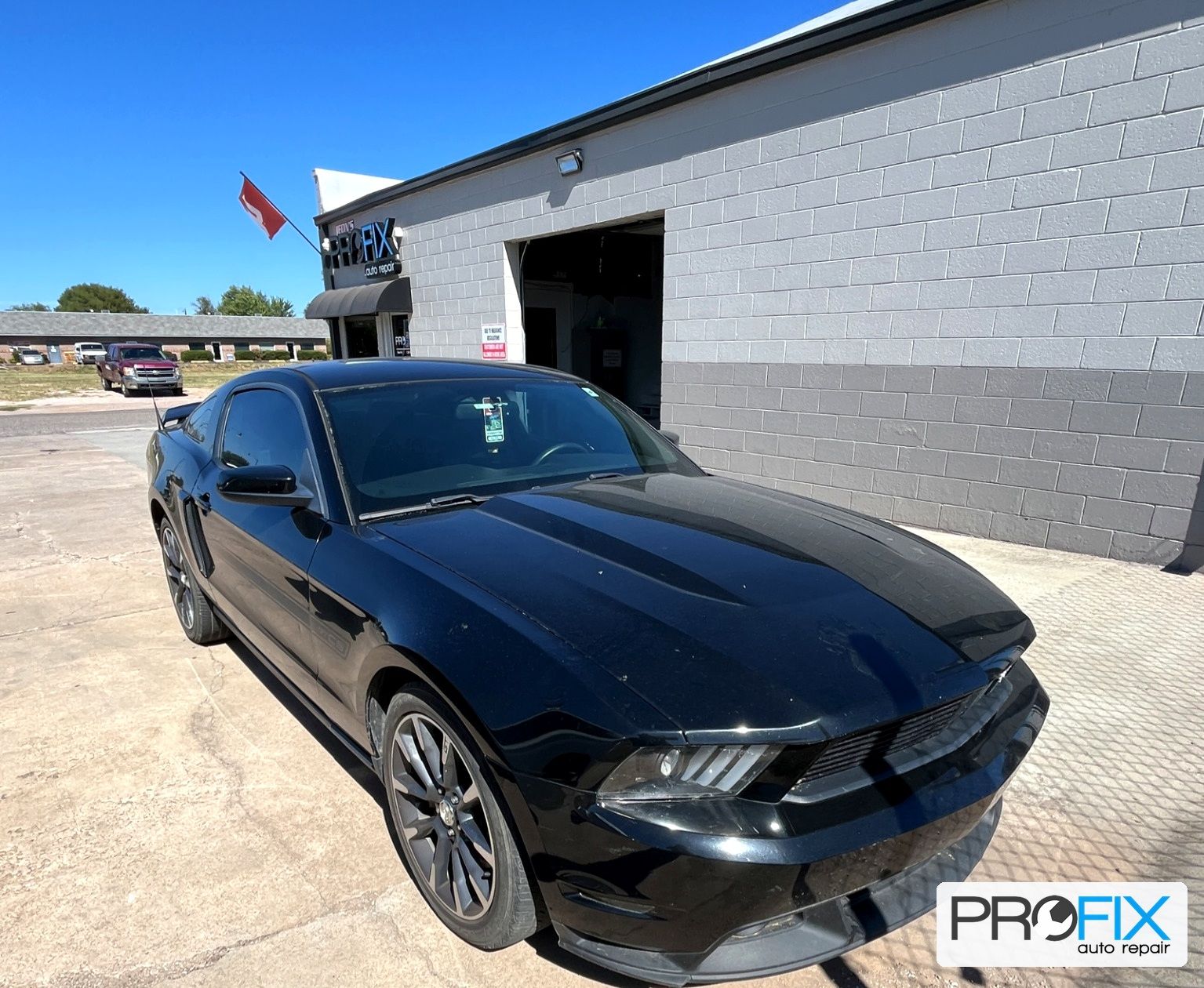 Black Ford Mustang GT outside PROFIX Auto Repair