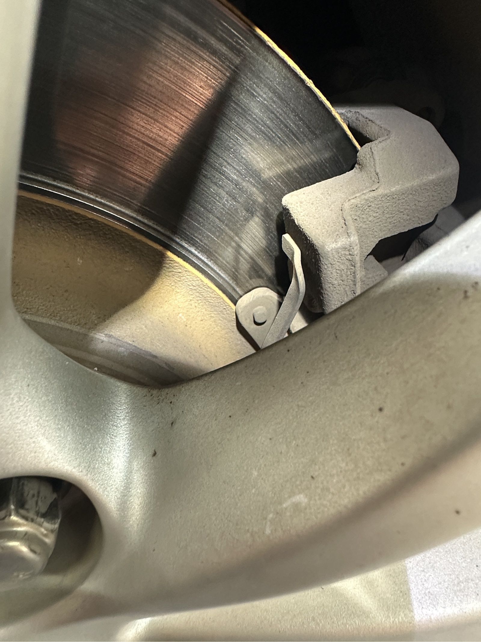 Brake components were inspected as part of the vehicle's digital inspection. The rear brakes had worn to metal-on-metal and required immediate attention.