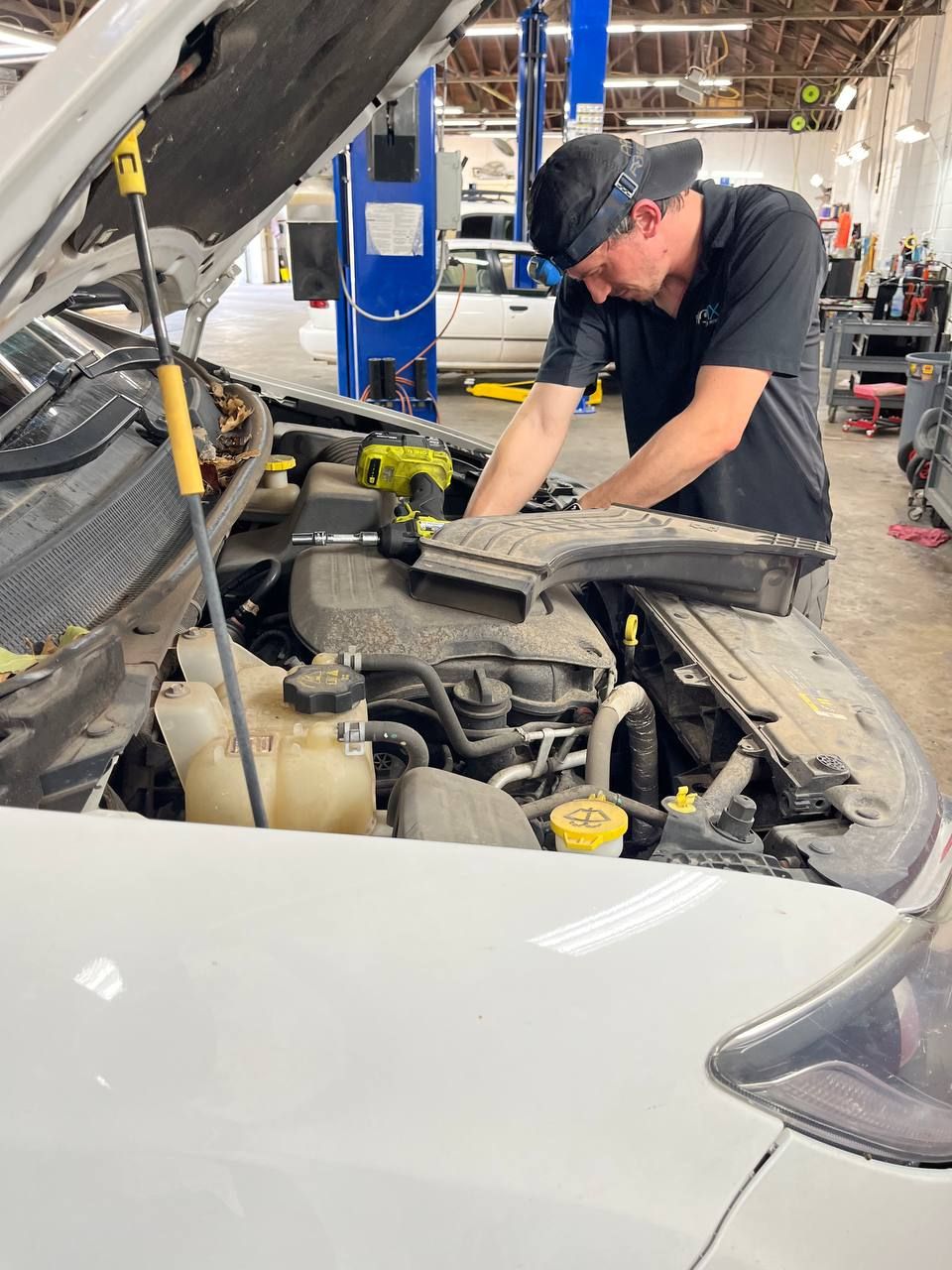 Our technician working on the 2018 Chrysler Pacifica at PROFIX Auto Repair in Norman, Oklahoma.