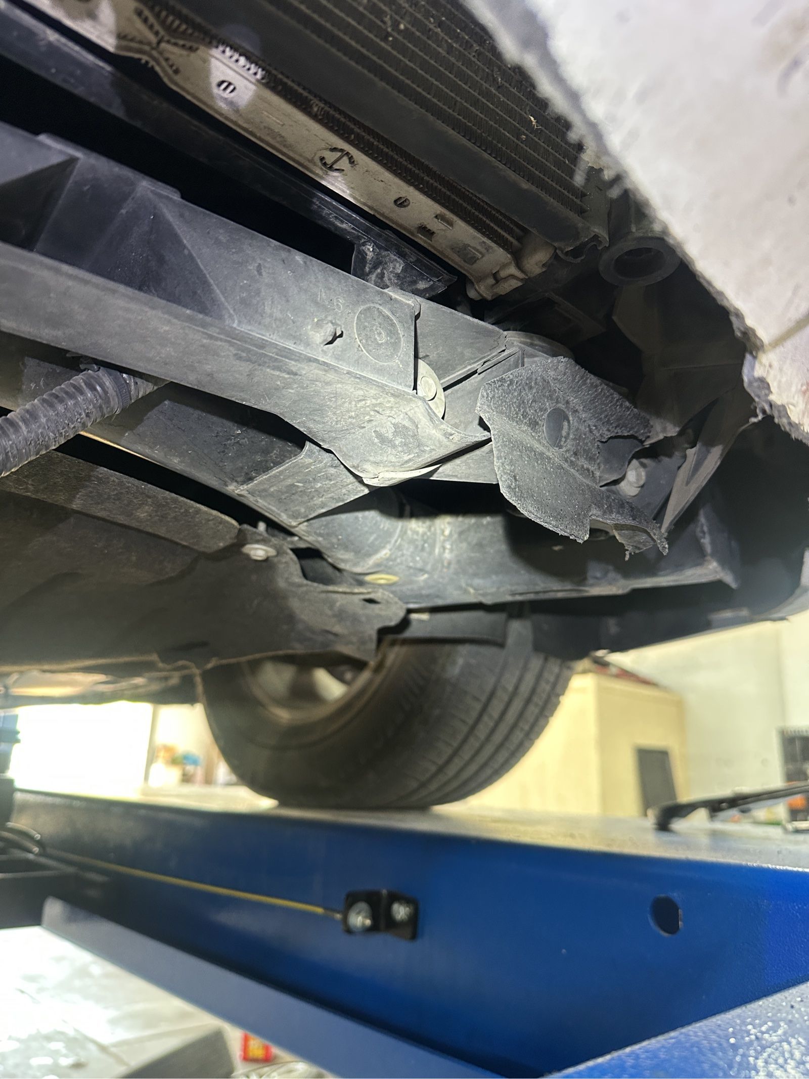 The lower radiator support on the Pacifica was broken and needed to be replaced.