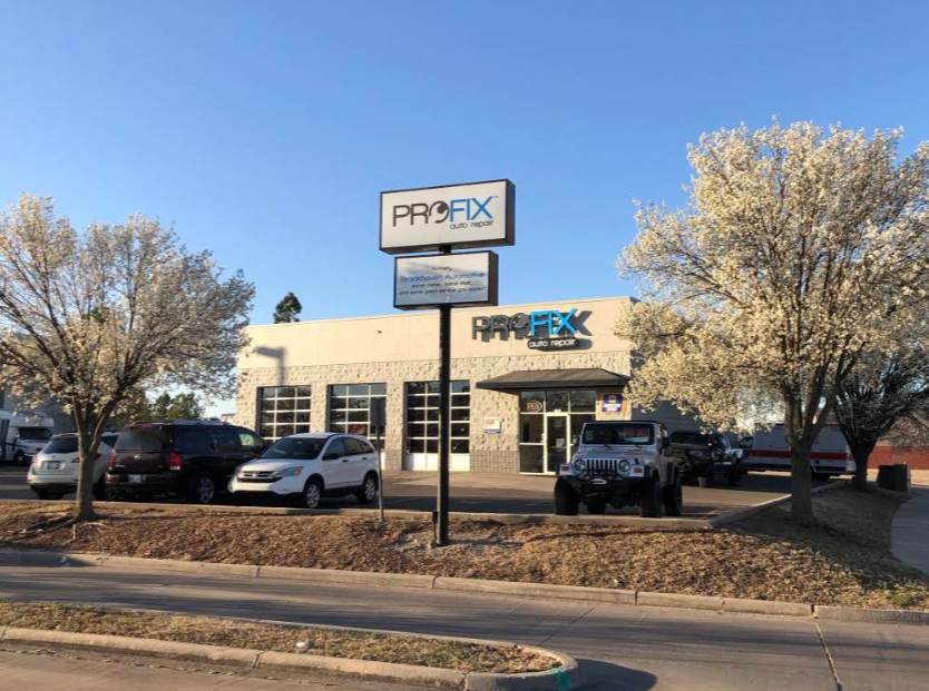 Exterior View Of PROFIX Auto Repair Shop With Sign And Parking Lot | PROFIX Auto Repair and Leon's PROFIX Auto Repair
