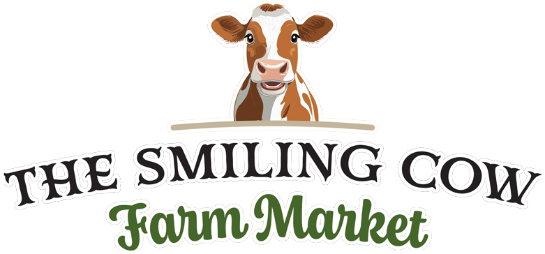 The smiling cow farm market logo is a brown and white cow smiling.