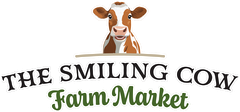 The smiling cow farm market logo is a brown and white cow smiling.