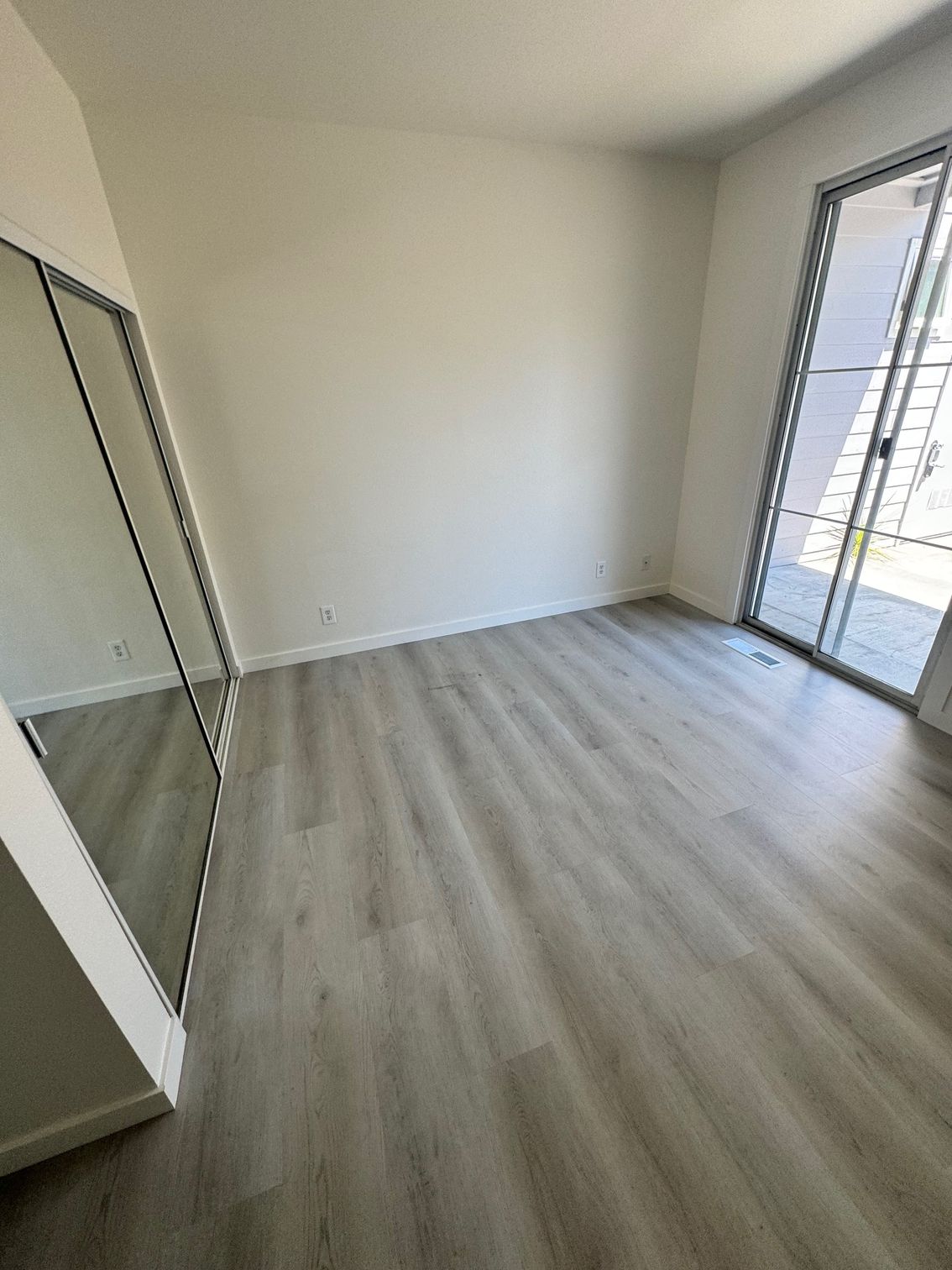 There is a large mirror in the middle of the room.