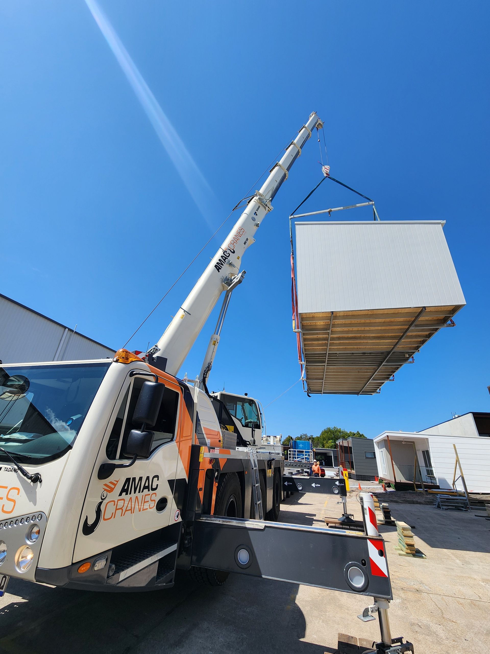 A Crane Lifting a Large Item — AMAC Cranes in Coolum Beach, QLD