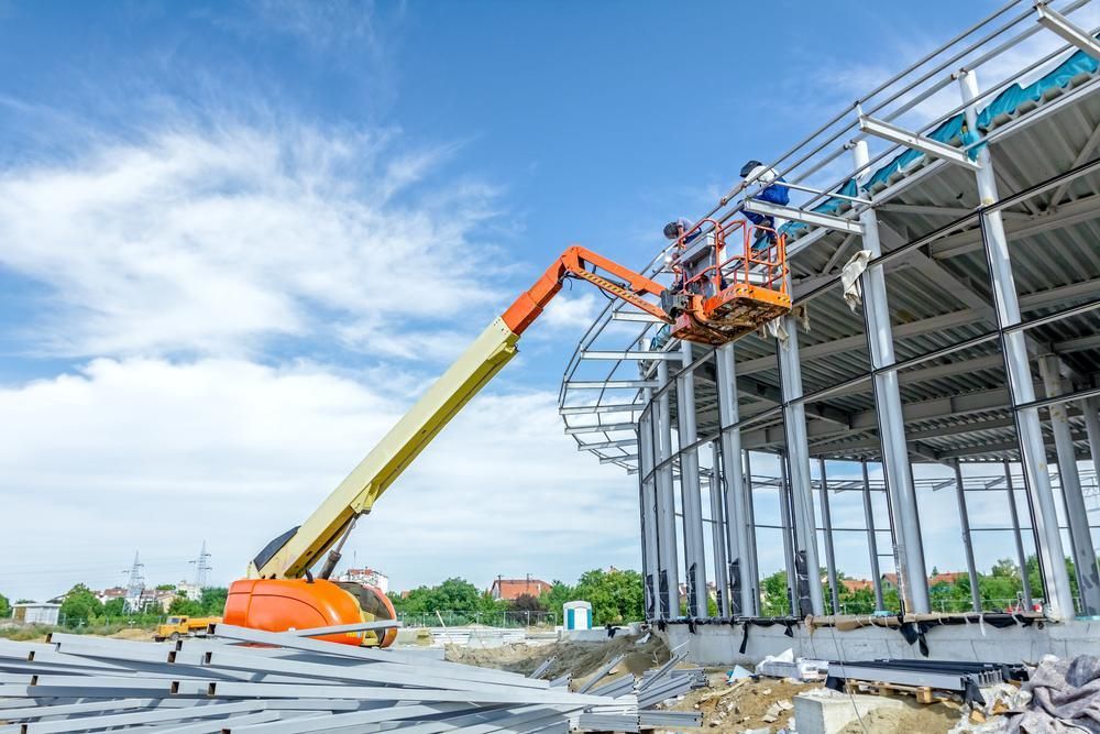 A Crane Is Being Used to Build a Building on A Construction Site — AMAC Cranes in Coolum Beach, QLD