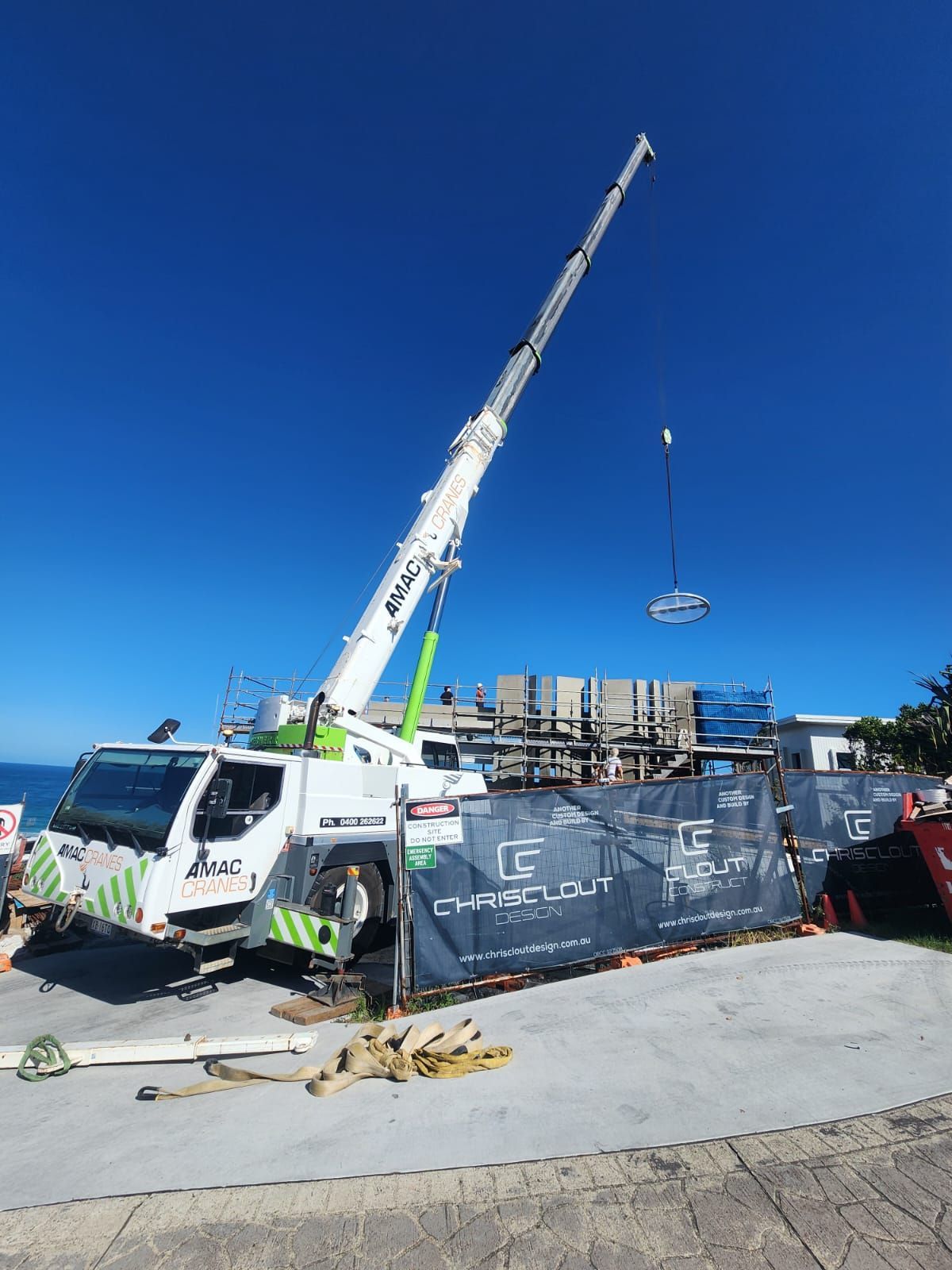 A White Truck with A Crane Attached to It — AMAC Cranes in Coolum Beach, QLD