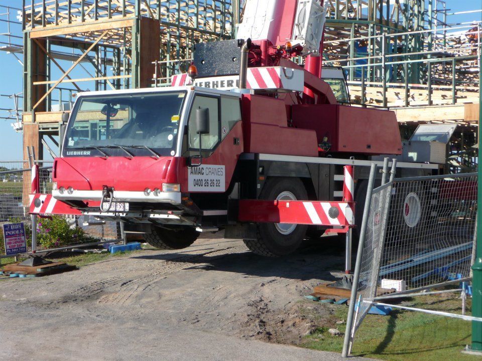 A Red Truck with The Word Liebherr on It — AMAC Cranes in Coolum Beach, QLD