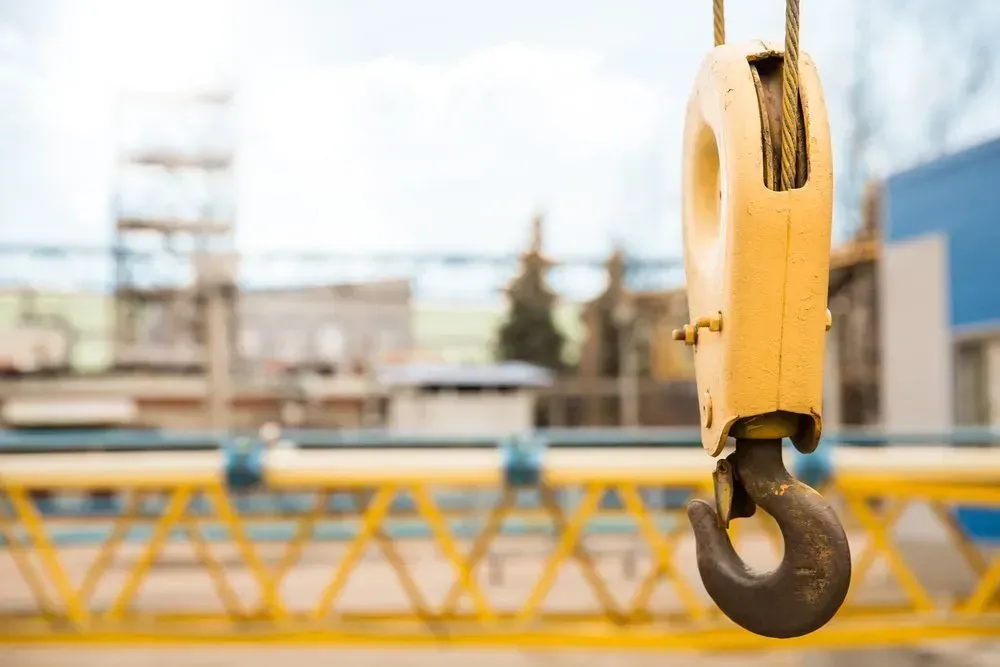 A Close up Of a Crane Hook Hanging from A Rope — AMAC Cranes in Coolum Beach, QLD