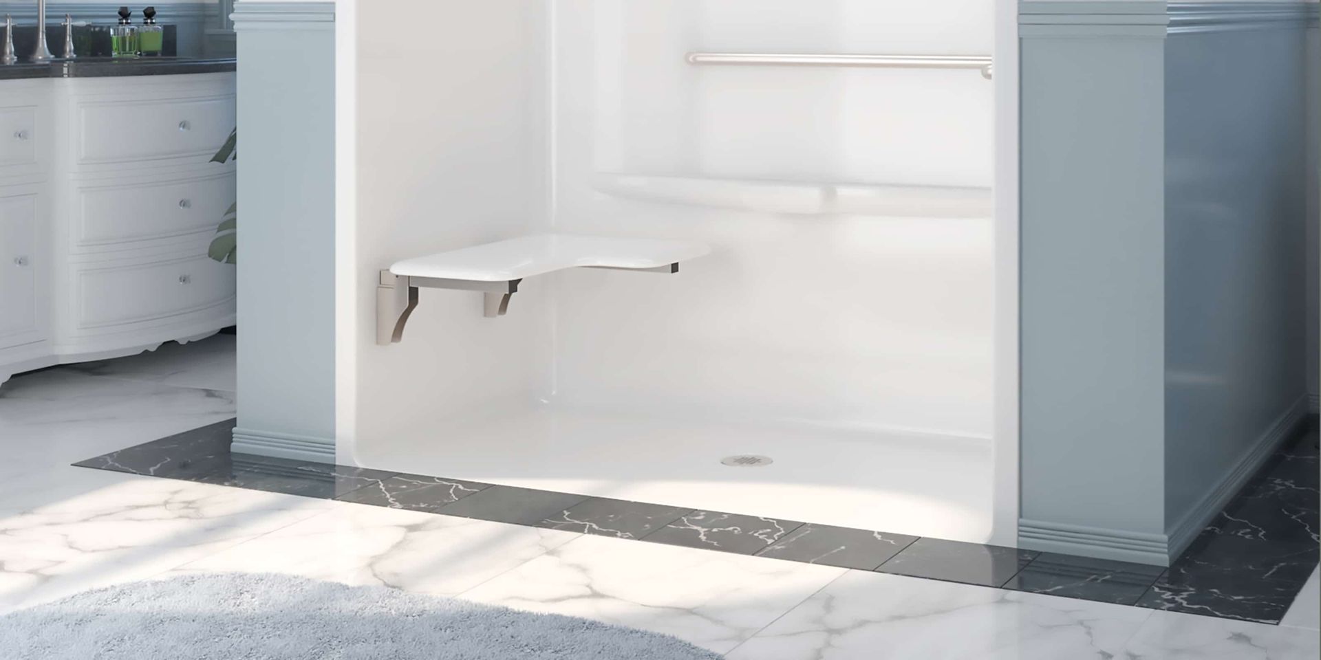 A bathroom with a walk in shower with a seat.