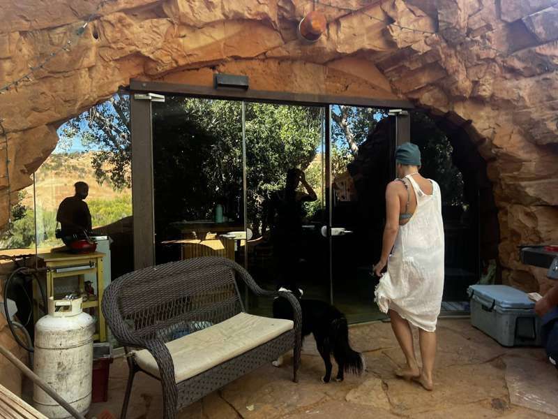 The glass-walled entrance to the Rock House