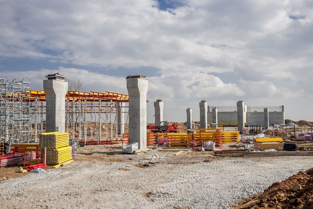 Construction Site With Concrete Pillars and Scaffolding — Top Tier Scaffolding In Gold Coast, QLD