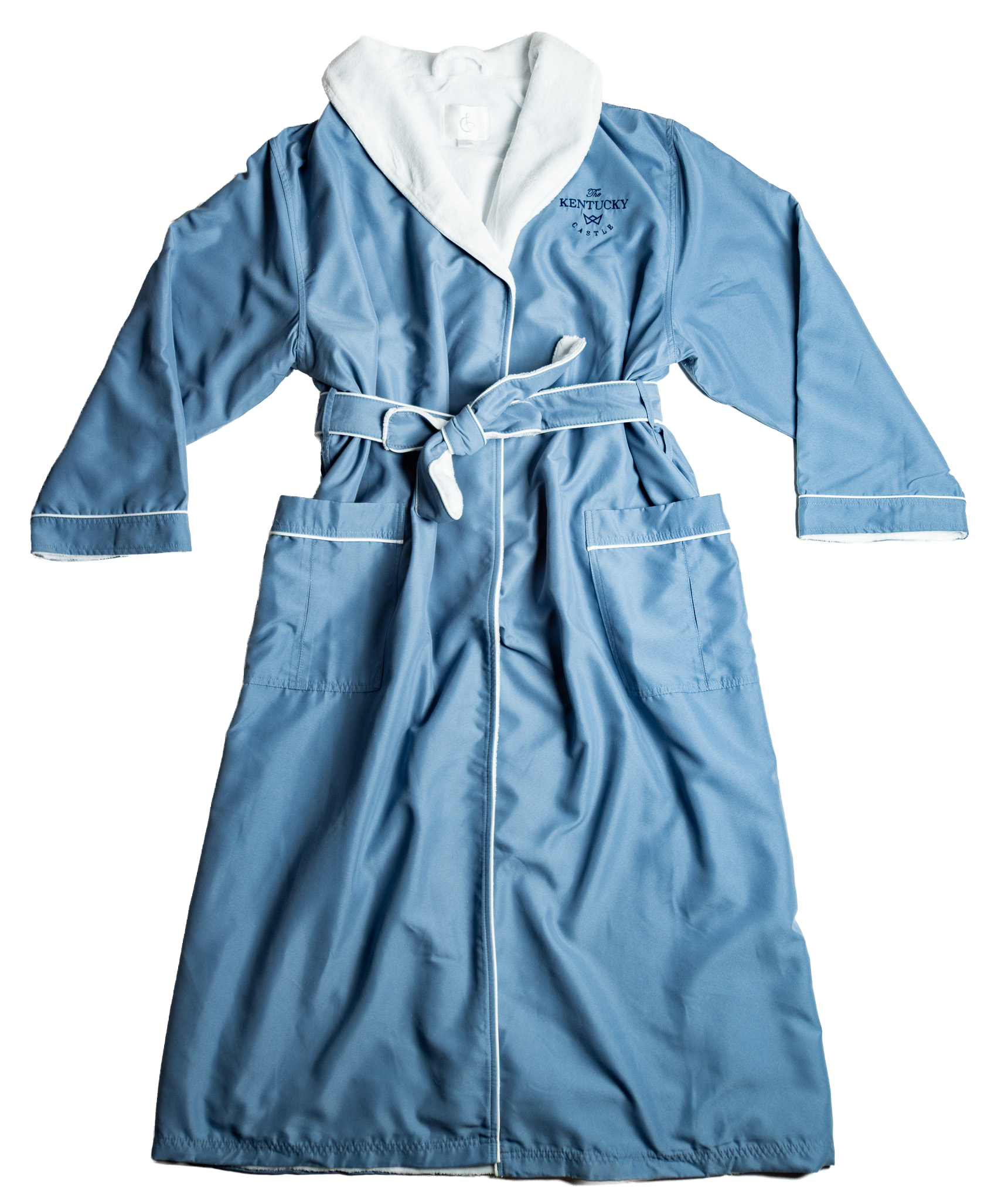a blue bathrobe laid flat with The Kentucky Castle embroidered on it