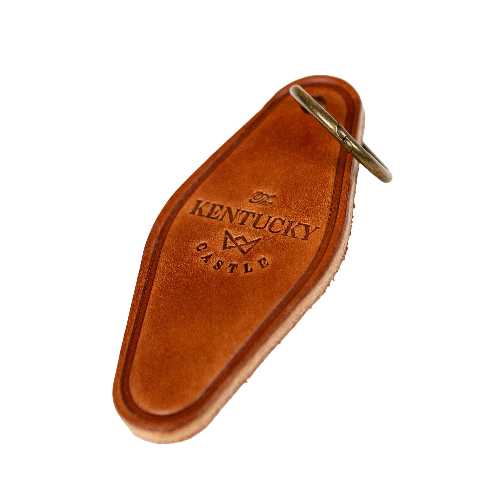 Brown leather Kentucky Castle key tag with brass ring.