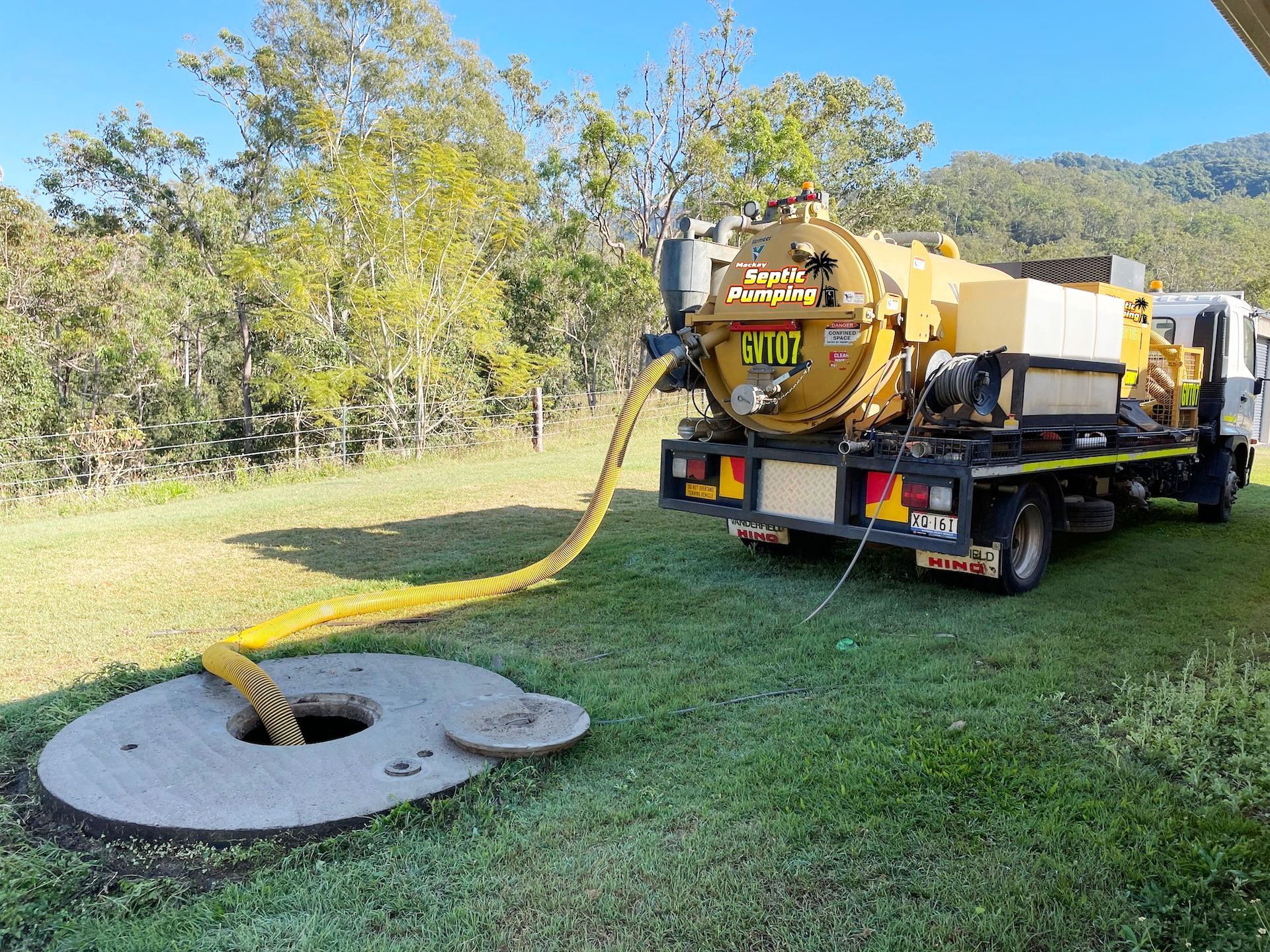 A Septic Tank With A Hose Beside It — Mackay Septic Pumping In Moranbah, QLD